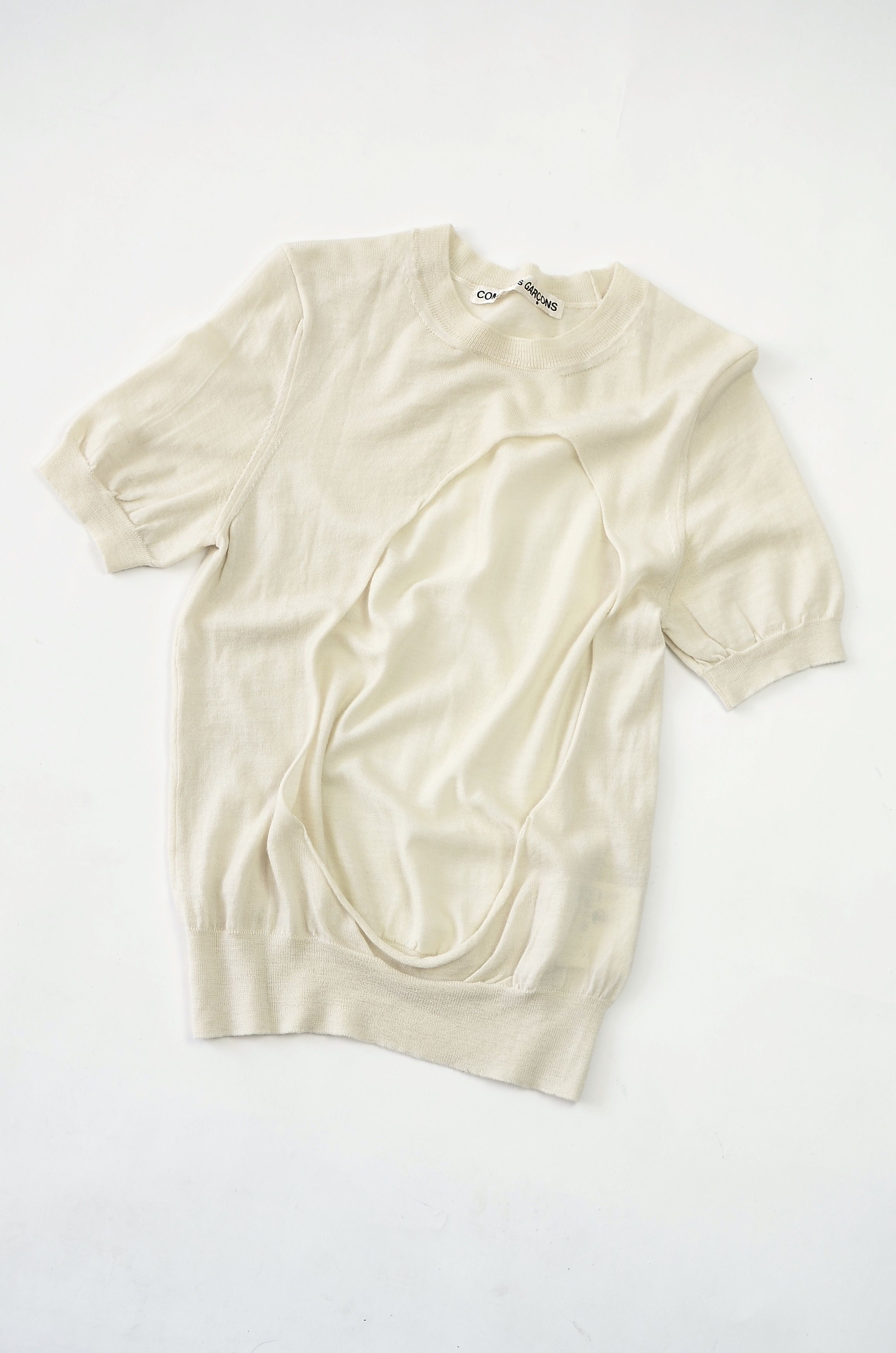 White cotton t-shirt photographed in a bright studio